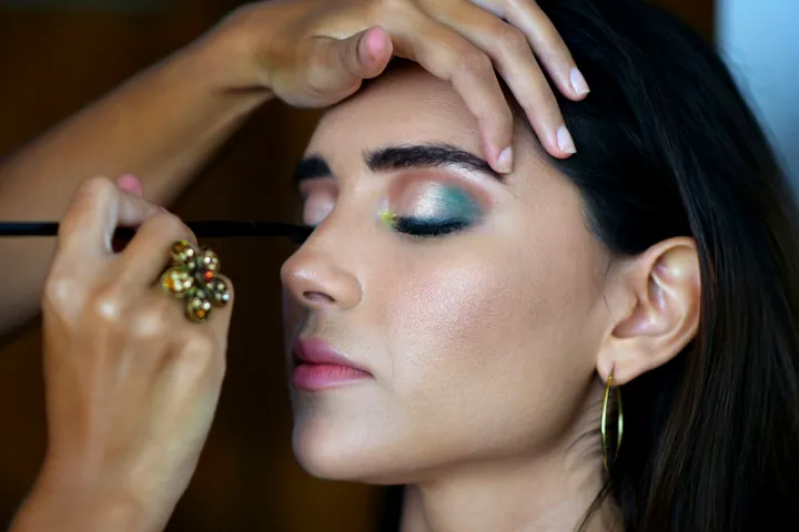 A creator during a makeup shoot